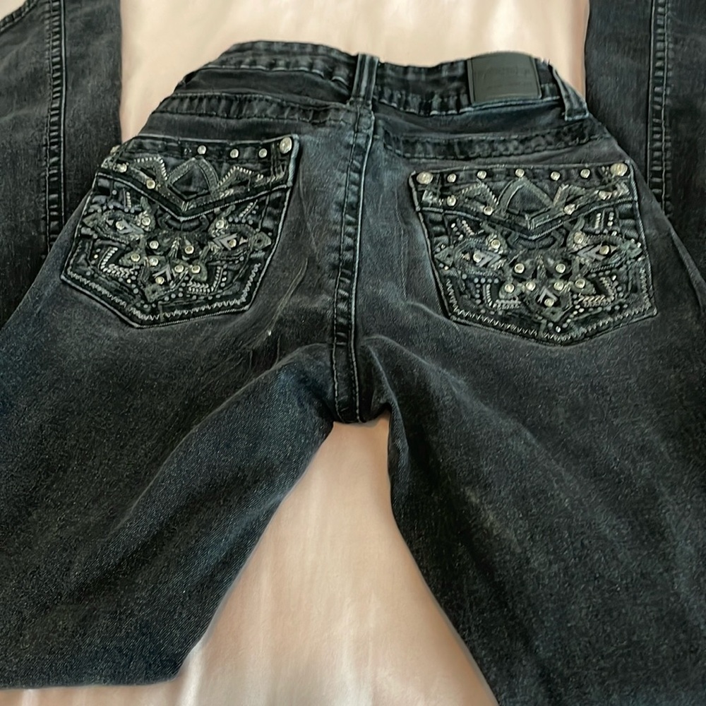 A little washed out but still very cute and no rips and no stains!